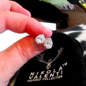 14 karat australian white gold diamond earrings.